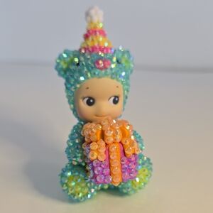 Sparkly Teal Sequin Baby Figurine Holding Gift - Kids Toys